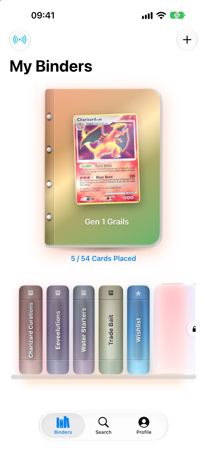 The PokeMichi binder shelf: a glass hero binder with a card on the cover above a row of colored binder spines